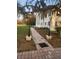 Elegant home with a walkway, landscaping, and columns at 15625 State Road 62 St, Parrish, FL 34219