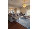 Spacious living room with sectional sofa and large rug at 15625 State Road 62 St, Parrish, FL 34219