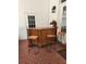 Wooden outdoor bar with two stools on brick patio at 15625 State Road 62 St, Parrish, FL 34219