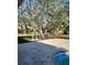 Pool and patio area with pergola and privacy fence at 15625 State Road 62 St, Parrish, FL 34219