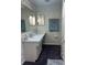 Bathroom features a vanity, toilet, and shower at 6709 Mornay Cir, Tampa, FL 33615