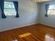 Spacious bedroom with hardwood floors and natural light at 6709 Mornay Cir, Tampa, FL 33615