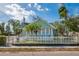 Charming light green house with white picket fence at 708 22Nd W St, Bradenton, FL 34205