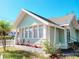 Renovated light green house with landscaping at 708 22Nd W St, Bradenton, FL 34205