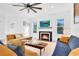 Living room with fireplace and stylish furniture at 708 22Nd W St, Bradenton, FL 34205