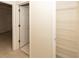 Spacious hallway closet with wire shelving for convenient storage at 7839 Primula Ln, New Port Richey, FL 34654