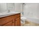 Bathroom with vanity, toilet and shower/tub combo at 3766 Johannesberg Rd, North Port, FL 34288