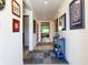 Bright hallway features stylish decor and leads to a spacious living area at 7729 Rosewood Garden Loop, Tampa, FL 33637