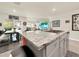 Modern kitchen with granite countertops and island at 7729 Rosewood Garden Loop, Tampa, FL 33637