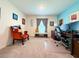 Office features plush carpet, plenty of natural light, and a comfortable work area at 7729 Rosewood Garden Loop, Tampa, FL 33637