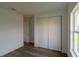 Simple bedroom with large closet and neutral decor at 10625 Ayear Rd, Port Charlotte, FL 33981