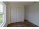 Spacious bedroom with large closet and neutral color palette at 10625 Ayear Rd, Port Charlotte, FL 33981