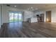 Open concept kitchen with island and stainless steel appliances at 10625 Ayear Rd, Port Charlotte, FL 33981