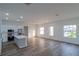 Modern kitchen with white cabinets, quartz countertops, and stainless steel appliances at 10625 Ayear Rd, Port Charlotte, FL 33981