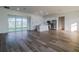Open concept living room and kitchen area with tile flooring at 10625 Ayear Rd, Port Charlotte, FL 33981
