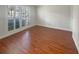 Bright bedroom with wood floors and large windows at 2253 Heron Cir, Clearwater, FL 33762