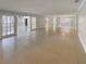 Bright living room featuring tile flooring and an open floor plan at 2253 Heron Cir, Clearwater, FL 33762