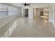 Open living room with tile floors and built-in shelving at 2253 Heron Cir, Clearwater, FL 33762