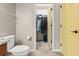 Bathroom with toilet, sink, and walk-in closet at 9231 Freedom Hill Dr, Seffner, FL 33584