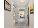 Bright and airy entryway with light gray walls and tiled floors at 9231 Freedom Hill Dr, Seffner, FL 33584