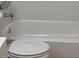 Clean bathroom with white toilet and bathtub at 4944 Hazner St # 4944, New Port Richey, FL 34652