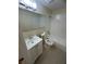 Clean bathroom with white tile, bathtub, and vanity at 4944 Hazner St # 4944, New Port Richey, FL 34652