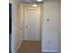 Bright entryway with tiled floors and neutral walls at 4944 Hazner St # 4944, New Port Richey, FL 34652