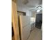 White kitchen appliances and granite countertop at 4944 Hazner St # 4944, New Port Richey, FL 34652