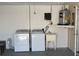 Laundry area with washer, dryer, and utility sink at 4944 Hazner St # 4944, New Port Richey, FL 34652