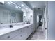 Modern bathroom with a marble countertop and updated fixtures at 1820 Rising Sun Dr # 4, Holiday, FL 34690