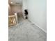 Upstairs hallway with gray carpet and neutral wall colors at 7113 Bowspirit Pl, Apollo Beach, FL 33572