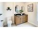 Clean bathroom with double vanity and updated fixtures at 7384 Van Lake Dr, Englewood, FL 34224
