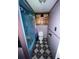 Small bathroom with shower/tub combo and cabinets at 6517 Mangrove Dr, Wesley Chapel, FL 33544