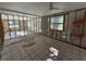 Under construction living room with new flooring and framing at 18839 Aripeka Rd, Hudson, FL 34667
