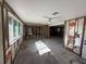 Under construction living room with new flooring and framing at 18839 Aripeka Rd, Hudson, FL 34667