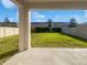Spacious backyard with grassy lawn and privacy fence at 6223 Springmont Loop, Palmetto, FL 34221