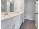 Modern bathroom with double vanity and tile flooring at 6223 Springmont Loop, Palmetto, FL 34221