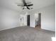 Spacious bedroom with carpet flooring and access to bathroom at 6223 Springmont Loop, Palmetto, FL 34221