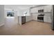 Modern kitchen with stainless steel appliances and island at 6223 Springmont Loop, Palmetto, FL 34221