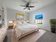 Spacious main bedroom with a large window and plush carpet at 6223 Springmont Loop, Palmetto, FL 34221