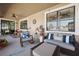 Relaxing back patio with seating area, perfect for outdoor enjoyment at 1726 Cameron Court, Trinity, FL 34655