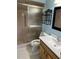 Clean bathroom featuring a shower and updated vanity at 2513 Lancaster Dr, Sun City Center, FL 33573