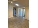 Tile entryway with high ceilings and access to other rooms at 2513 Lancaster Dr, Sun City Center, FL 33573