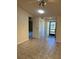Bright and airy entryway with tile floors and ample natural light at 2513 Lancaster Dr, Sun City Center, FL 33573