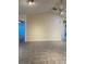 Spacious living room with neutral walls and tile flooring at 2513 Lancaster Dr, Sun City Center, FL 33573