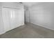 Simple bedroom with a large closet and neutral wall color at 17827 Turning Leaf Cir, Land O Lakes, FL 34638
