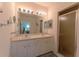 Bright bathroom with double vanity and shower at 3919 Cape Haze Dr # 503, Rotonda West, FL 33947