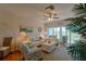 Living room with light beige couches, a coffee table, and sliding doors to balcony at 3919 Cape Haze Dr # 503, Rotonda West, FL 33947