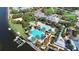 Aerial view of community pool, clubhouse, and marina at 1070 Signet Dr, Apollo Beach, FL 33572