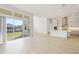 Bright Gathering room with sliding glass doors leading to the backyard at 1070 Signet Dr, Apollo Beach, FL 33572